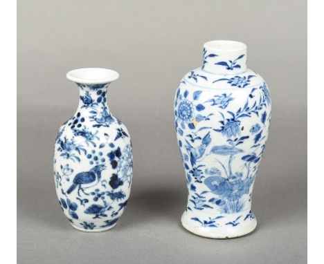 A Chinese blue and white porcelain baluster vaseDecorated with birds amongst floral sprays, blue painted four character Kangx