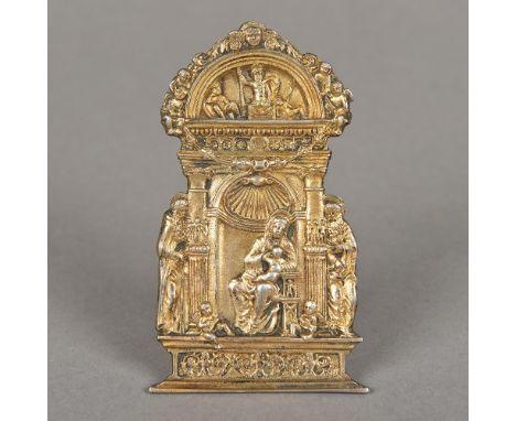 An 18th/19th century Italian cast gilded white metal pax Worked with the Holy Family in an alcove beneath an architectural ar