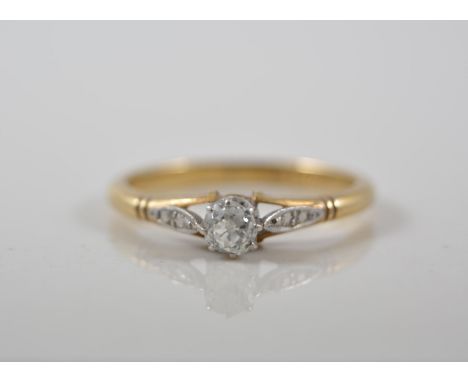 Yellow and white metal diamond solitaire dress ring, marked 18ct and plat, the diamond approximately 0.20ct. 