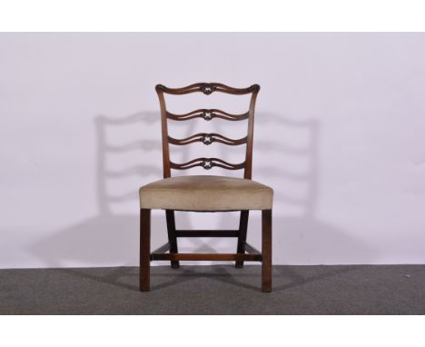 Chippendale style mahogany dining chair, with open wavy ladder back, serpentine seat, moulded legs joined by 'H' stretchers, 