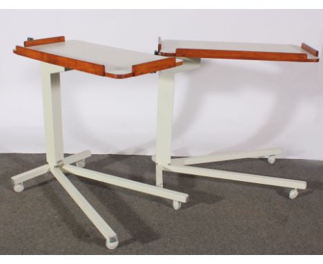 Pair of laminated and stained wood adjustable bed tables, length 77cm (2)