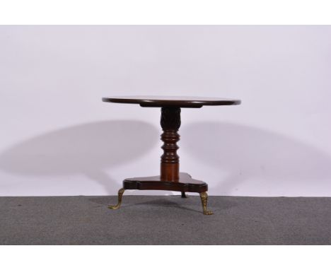 Victorian mahogany occasional table, circular top, carved and ring turned column, platform base with brass feet, diameter 60c