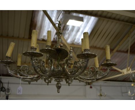 Cast silvered metal centre light fitting, with eight scrolled branches, diameter 82cm.