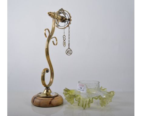 Brass wall light, scrolled branch, lemon tinted, crimped shade, depth 31cm.