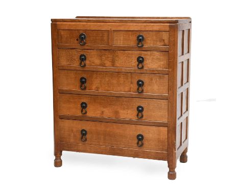 Robert Mouseman Thompson (1876-1955): An English Oak Chest of Drawers, with raised upstand, adzed top, above two short over f