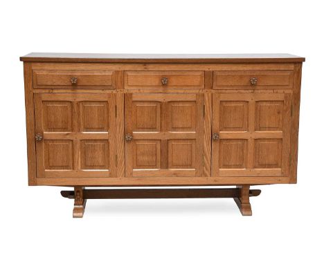 Beaverman: Colin Almack (1930-1996) (Sutton-under-Whitestonecliffe): An English Oak Panelled 5ft Sideboard, the smooth rectan