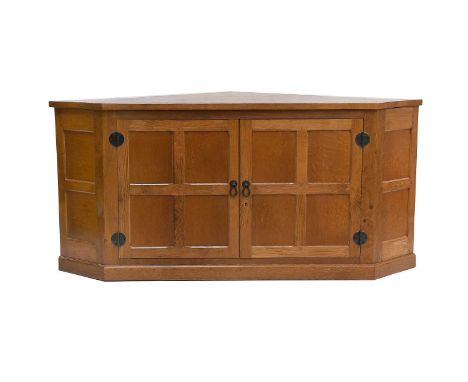 Cat and Mouseman: Lyndon Hammell (1954-2015) (Harmby): An Oak Panelled Television Corner Stand, the adzed top, above two cupb