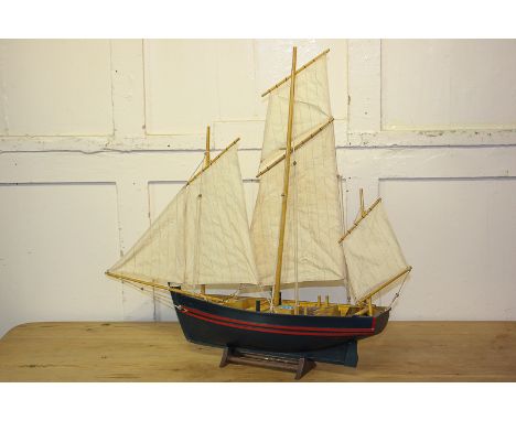A wooden model ship, The Dew of the Sea (sea lavender) with three masts and five sails, 69cm long