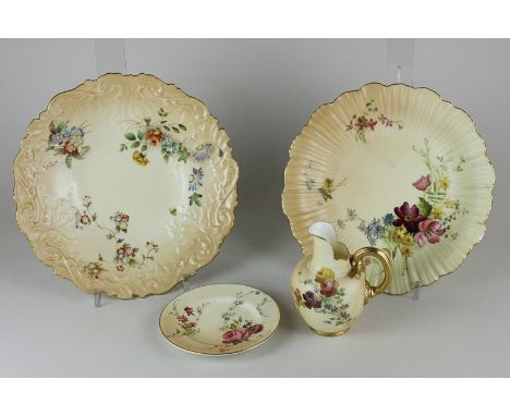 Two Royal Worcester porcelain dishes with floral sprays on blush ivory ground, a similar cream jug and small plate