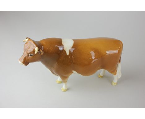 A Beswick porcelain Guernsey bull, Champion Sabrina's Sir Richmond 14th, model 1451, in tan and white gloss