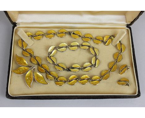 David Andersen, a silver gilt and enamel Willy Winnaess necklace with double leaf shaped links in yellow/gold enamel, a match