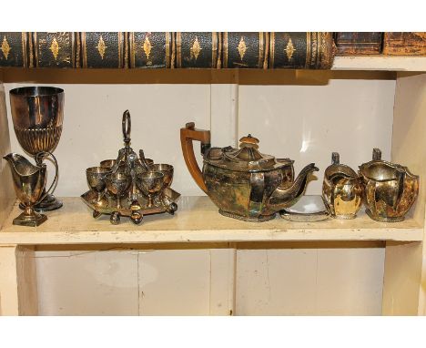 A silver plated three-piece tea set, James Dixon & Sons, chromium plated hip flask, a silver plated egg cup and spoon stand f