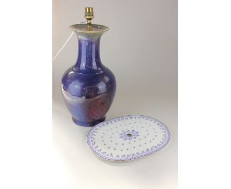 A Wedgwood pearlware Strawberry Leaf pattern strainer, together with a blue pottery baluster table lamp, 42cm