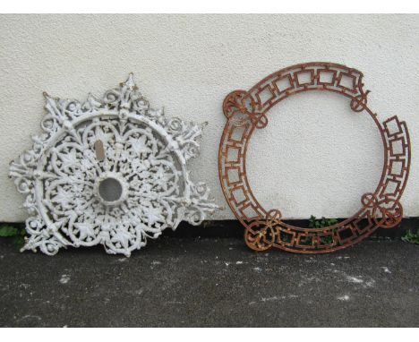 Architectural salvage, two 19th century cast iron ceiling roses with pierced detail 87cm diameter (maximum) (AF) (2)