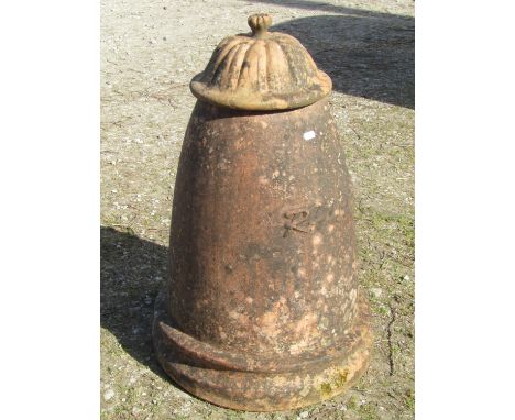 A weathered conical shaped terracotta rhubarb forcer with lid, 70cm approx