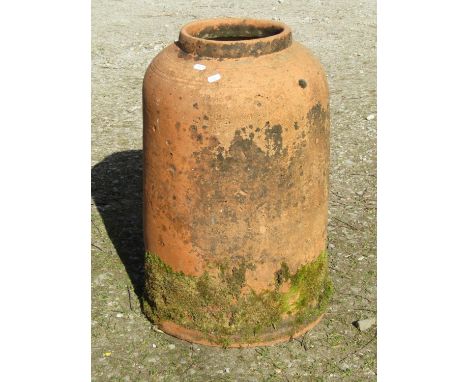 A weathered terracotta bell shaped rhubarb forcer, with incised banded collar, 65cm high