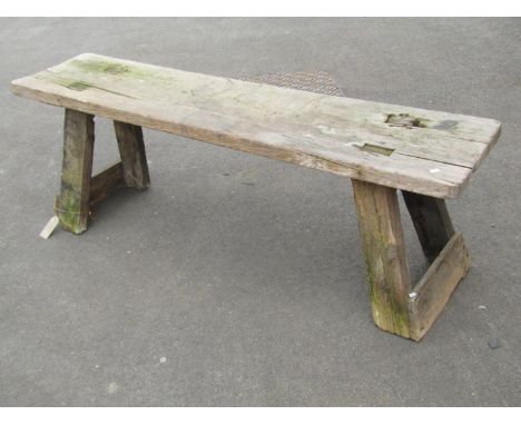 A rustic weathered pine pig bench, 48cm high, 153 x 36cm