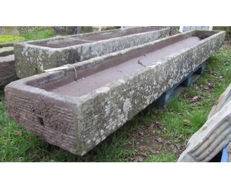 A good weathered carved natural stone garden trough of rectangular form with tapered interior, 21 cm high x 293 cm x 43 cm