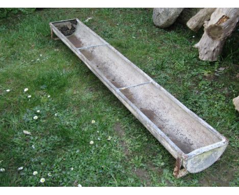 A vintage galvanised steel rectangular and rounded feeding trough with simple rung divisions, 15cm high x 183cm (6ft) x 27cm 