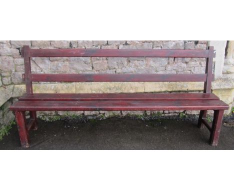A Victorian stained pine bench with through jointed chamfered rail back over a slatted seat, 94cm full height x 208cm x 42cm 