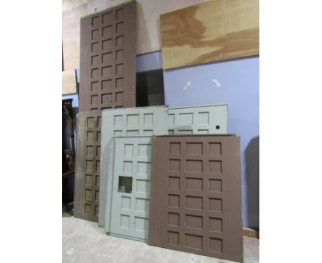Seven large sections of pine panelling, some with painted finish.