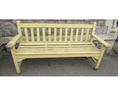 An R A Lister Burma teak three seat garden bench with slatted seat and back (painted light yellow), 159 cm long