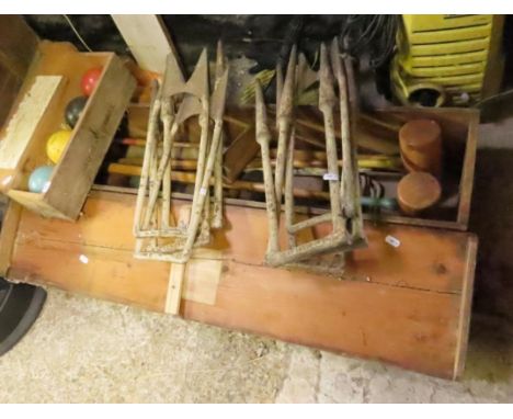 A vintage Jacques &amp; Son of London croquet set in a pine case together with a number of earlier cast iron cast iron croque