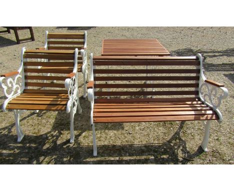 A refurbished heavy gauge four piece garden terrace set with hardwood slats and cream painted open scroll pattern cast iron s