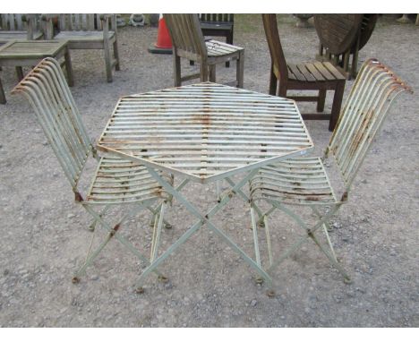 A light green painted and weathered three piece folding garden terrace set with slatted detail, the table top 90 cm x 78 cm