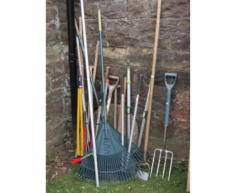 A collection of contemporary garden tools together with two push mowers by Qualcast &amp; Challenge 