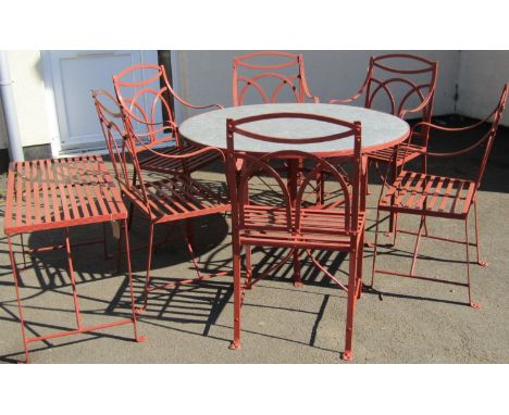 In the Regency style, a set of six Matthew Eden painted strapwork garden chairs with fluted arms and backs, with loose cream 