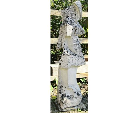 A weathered stone abstract / post-modern figural garden sculpture raised on a simple square platform base, 100cm high