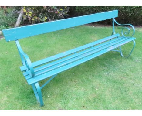 A traditional garden bench with sprung steel frame and timber lathes, 195 in length