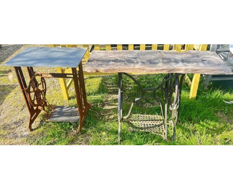 Two weathered cast iron treadle sewing machine bases White &amp; Singer examples later adapted as garden tables with weathere