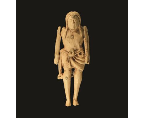 12th-15th century AD. A bone figure of St. Sebastian wearing a loincloth and with articulated arms, arrow wounds on head, che