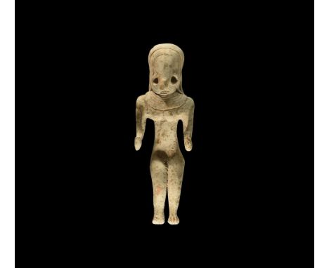 3rd-2nd millennium BC. A ceramic figurine with large D-shaped head and applied hair falling to the shoulders, flexed arms and