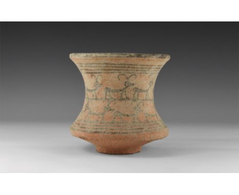 Harappa Culture, 4th-3rd millennium BC. A ceramic beaker vessel decorated with two rows of cattle and a border of painted lin