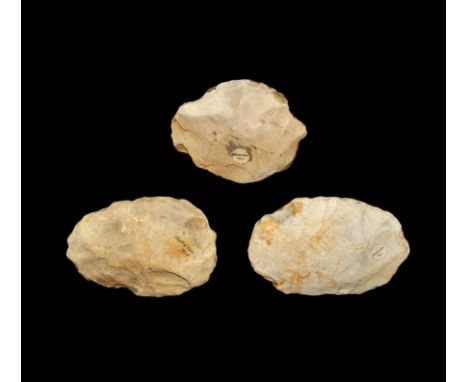 Palaeolithic, circa 400,000 BP. A group of ovate bifacial flint handaxes with cream-grey patination; two with inked collectio