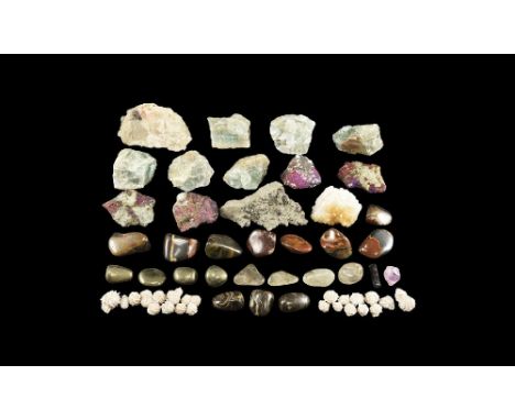 A mixed group comprising: selenite rose specimens from Mexico; polished chalcopyrite from Peru; rutile crystals in polished q