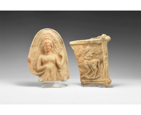 5th-2nd century BC. A group of ceramic plaques consisting of: a standing female, possibly a goddess, with an elaborate hairst