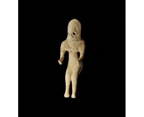 3rd-2nd millennium BC. A ceramic figurine with large D-shaped head and applied hair falling to the shoulders, flexed arms and