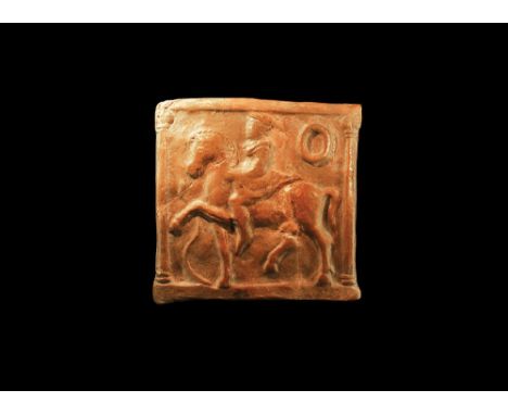 5th-3rd century BC. A square ceramic plaque with male in short cloak and hat, on a horse with leg raised, snake rising up in 