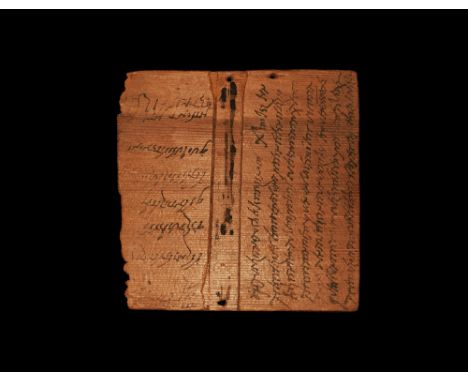 Dated 19th May, 274 AD.
A wooden tabula with holes to the long borders, recess to one face with indistinct traces of letterin