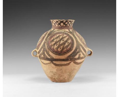 Neolithic, Majiayao Culture, 3300-2000 BC. A ceramic jar with flaring rim and short neck, globular body with painted decorati