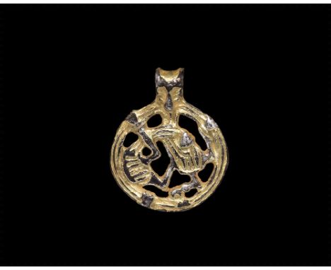 Late 10th-early 11th century AD. A silver-gilt Scandinavian pendant of Riddarholmen type, also widespread in the historical R