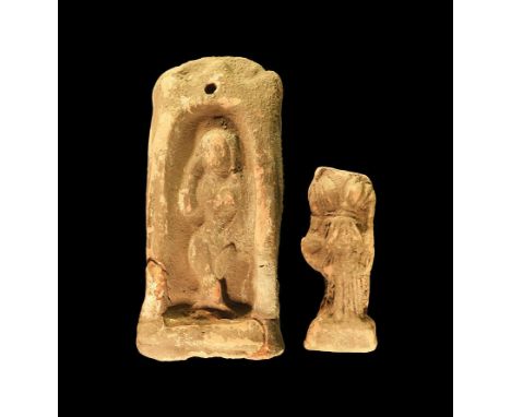 4th-1st century BC. A group of ceramic votive figures consisting of a shrine with the naked figure of Aphrodite; the torso of