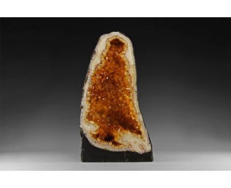 A fine citrine-lined agate geode 'cathedral' with an initial growth of medium crystals followed by a second growth phase of l