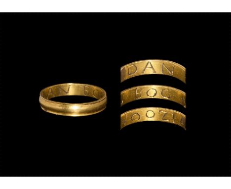 19th century AD. A D-section gold hoop with everted borders, inscribed in capitals to the inner face 'DAN BOC NOOZIA' (person