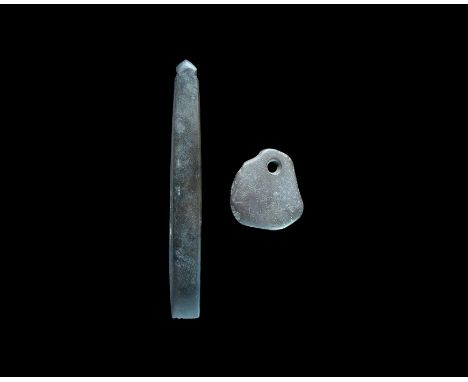 Neolithic, 4th-3rd millennium BC. A mixed pair of Volosovo culture artefacts comprising: a D-shaped flat-section pendant; a n