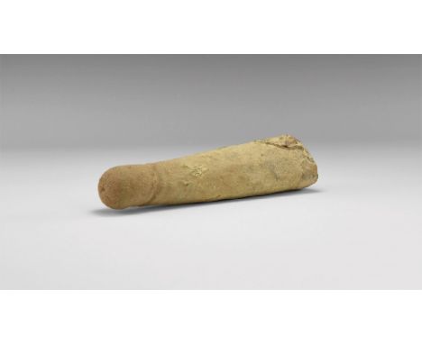 1st-2nd century AD. A ceramic phallus with tapering shaft and glans indicated by incised lines. 245 grams, 16cm (6 1/4"). Pro